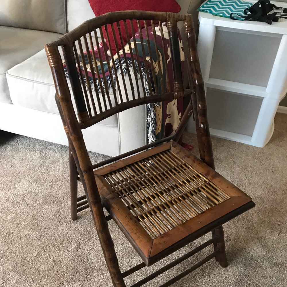 Black mirror and a wooden chair